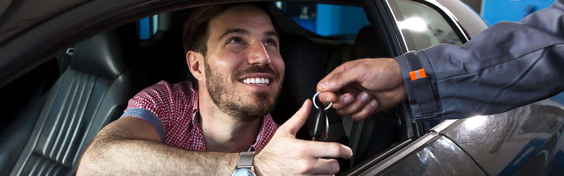 customer in car getting keys